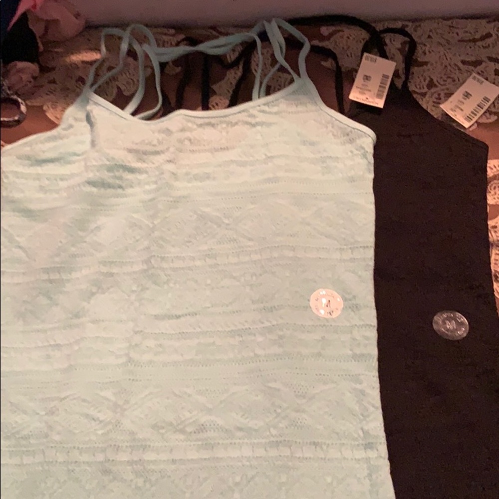 Two spaghetti strap tops.